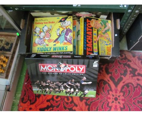 An All Backs charity edition Monopoly and other vintage games