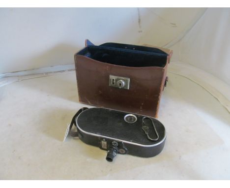 A Bell &amp; Howell Film Camera 75 in leather case