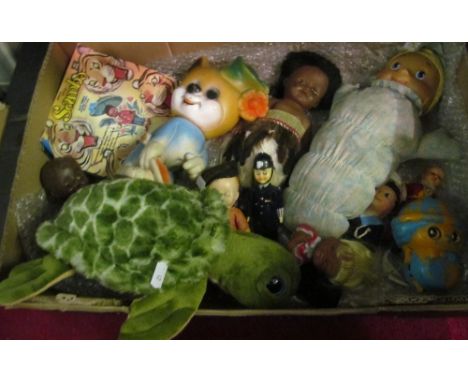 A group of vintage toys and dolls