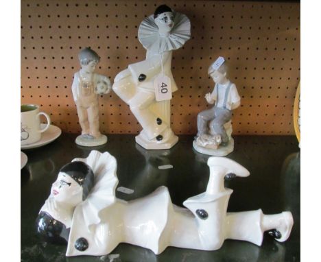Two clown ornaments and two Nao models