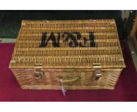 A Fortnum &amp; Mason picnic hamper with five tea canisters