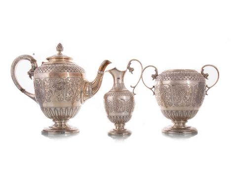 VICTORIAN SILVER THREE-PIECE TEA SERVICE HAMILTON & INCHES, EDINBURGH 1873 each of tapered form, cast, chased and embossed wi
