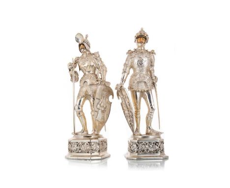 PAIR OF GERMAN SILVER AND IVORY FIGURES OF KNIGHTS ATTRIBUTED TO B. NERESHEIMER & SOHNES, PSEUDO-HANAU MARKS  with import mar