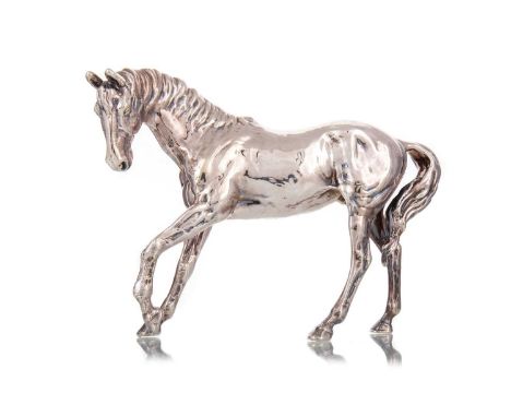 WHITE METAL MODEL OF A HORSE CONTEMPORARY stamped 925 to underside, filled17.5cm highCondition generally good. Light wear. Ma
