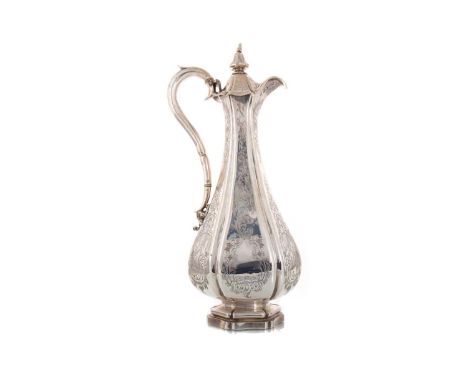 VICTORIAN SILVER CLARET JUG CHARLES REILLY & GEORGE STORER, LONDON 1844  the hinged cover with baluster finial, the scroll ha
