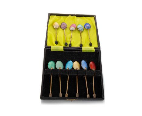 SET OF SIX GILT METAL AND HARLEQUIN ENAMEL COFFEE SPOONS EARLY 20TH CENTURY each stamped ENGLAND to stem, in fitted case, alo