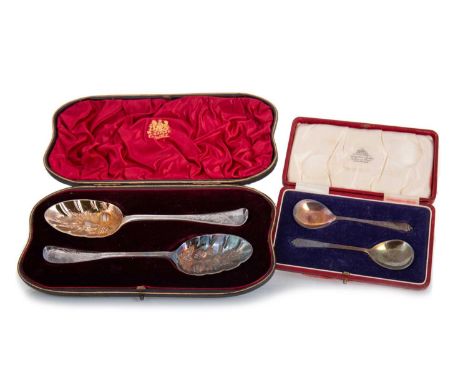 PAIR OF GEORGIAN TABLE SPOONS MID-18TH CENTURY later embossed as berry spoons, and a pair of preserve spoons, each casedBerry