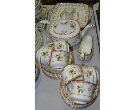 Twenty-four pieces of Wedgwood 'Bianca' decorated tea ware, comprising: teapot, milk jug, six each cups and saucers, seven si