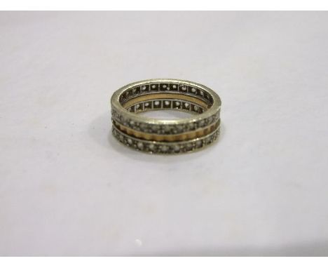 A 9ct gold eternity ring set synthetic white stones, size M½, 4.4g. 