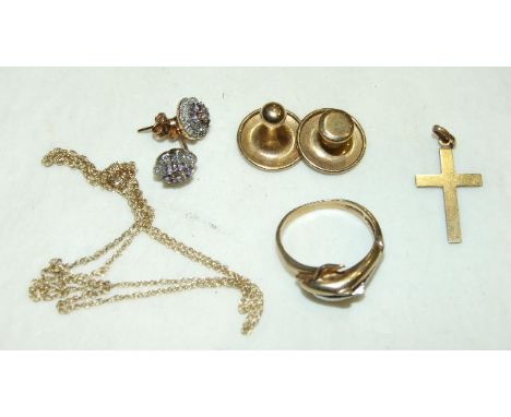 A 9ct gold cross on chain, a 9ct gold ring and two studs, 6.1g and a pair of unmarked Tanzanite cluster earrings. 