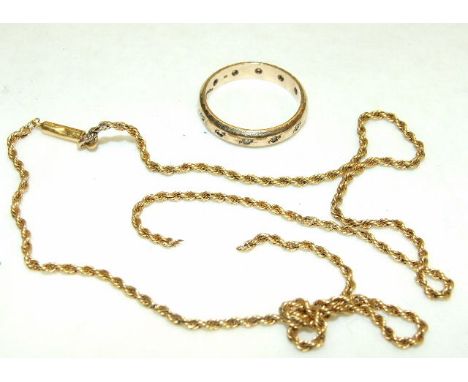 A 9ct gold ring set white stones and a 9ct gold rope-twist neck chain, (broken), total weight 5.2g. 