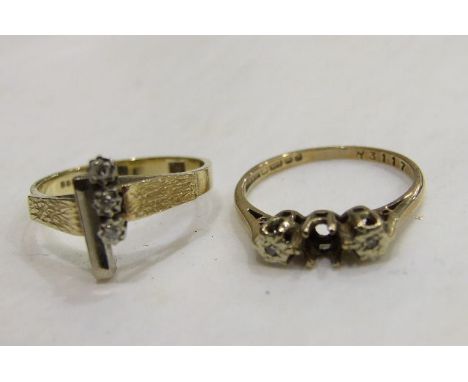 A 9ct gold ring set three synthetic white stones, size K and a 9ct gold ring set two diamonds either side of a vacant setting
