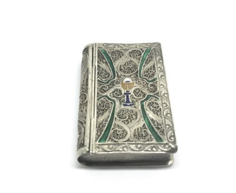 A Quality Silver and enamel Continental filigree box in the form of a hinged book. 6cmx4cm.