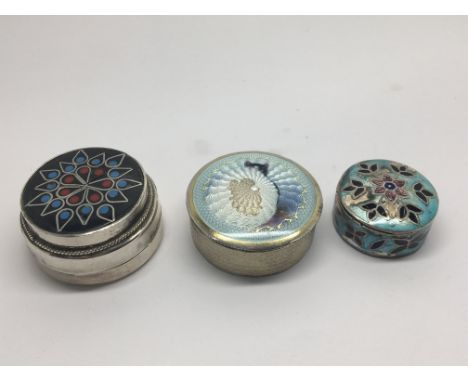 Three Continental silver and enamel decorated boxes 3cm.