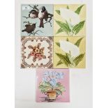 Late Victorian tile decorated with birds on branches, two similar tube-lined lily decorated tiles