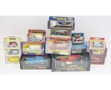 Collection of boxed diecast vehicles including Burago 1/18 scale Mercedes Benz SSK (1928), Burago 1/24 scale Bugatti Atlantic