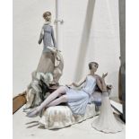 A tall Lladro figure of a lady beside a deer, on tree stump base and a Lladro figure of an Art