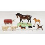 Beswick model of a chestnut horse on green base, printed black marks with green and gold label, 23cm