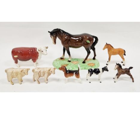 Beswick model of a chestnut horse on green base, printed black marks with green and gold label, 23cm wide, a Beswick cow 'CH 