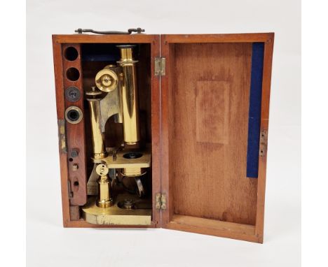 Early 20th century gilt brass microscope by R &amp; J Beck of London, model no. 7999, with spare lenses, contained in it's or