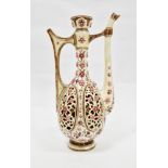 Early 20th century Zsolnay Pecs reticulated ewer having tall neck and floral pierced panels, printed