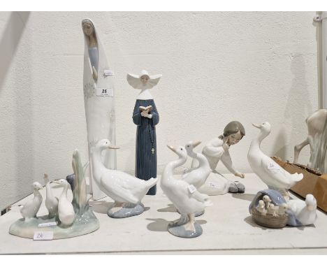 Group of Lladro and Nao figures and models of animals&nbsp;including a Lladro figure of virgin, 34.5cm high, another of a nun