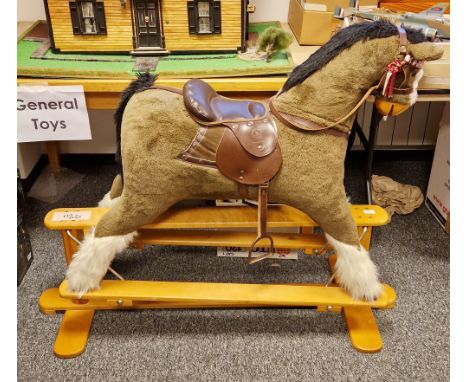 Mamas and Papas ' Rocking Horse collection ' bay rocking horse with leather bridle and saddle, held on a light wooden trestle