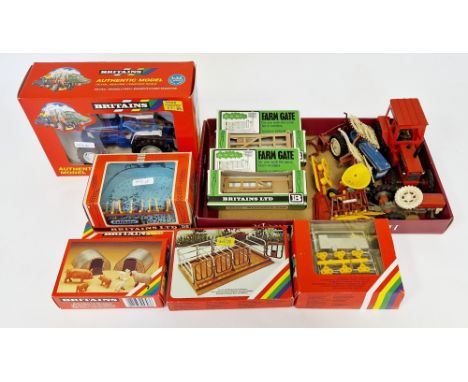 Britains farming models&nbsp;to include 9527 Ford 5610 Tractor, 1717 Water Trough, 9536 cultivator, 1716 Animal Pens, 4703 2 