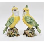 Pair of Delft polychrome models of parrots, probably Dutch, 19th century, blue script AG/15 to