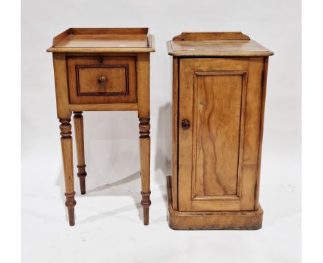 19th century mahogany pot cupboard, the top with three-quarter upstand over a single door raised on turned tapering legs, 79c
