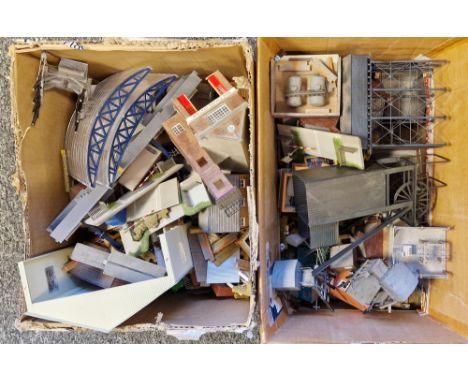 Two boxes of various model railway layout accessories to include tanks, signals, sheds etc.