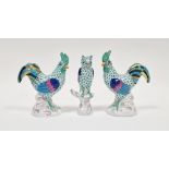 Two Herend porcelain models of cockerels and a model of an owl, printed blue marks, all decorated