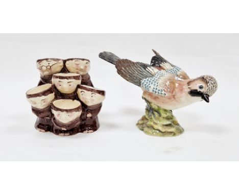 Beswick pottery model&nbsp;of a jay, marked to base 1219, 25cm wide and a pottery novelty egg stand&nbsp;in the form of a gro