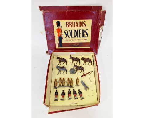 Mixed lot of cast metal figures including 5 Britain's Indian Army Services mules with canon, set of six Indian Army service s