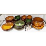 Composite French pottery (St. Clement) part dinner-service, glazed in green and ochre, printed and
