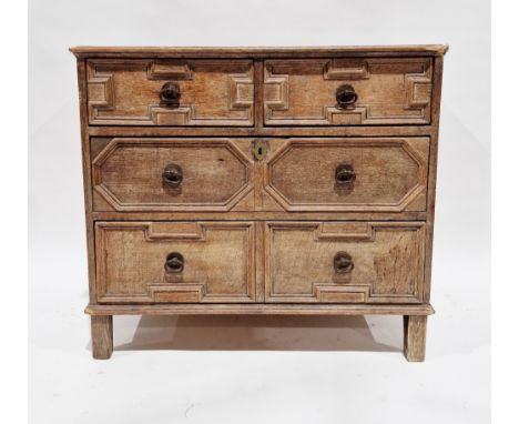 19th century Jacobean revival pale oak chest of two short over two long graduating drawers, the top with thumbmould edge, the