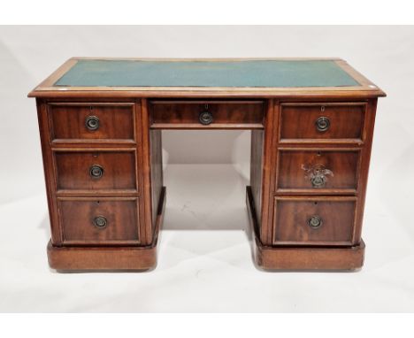 19th century mahogany twin-pedestal desk, the leatherette inset top with thumbmoulded edge over an arrangement of six draewrs