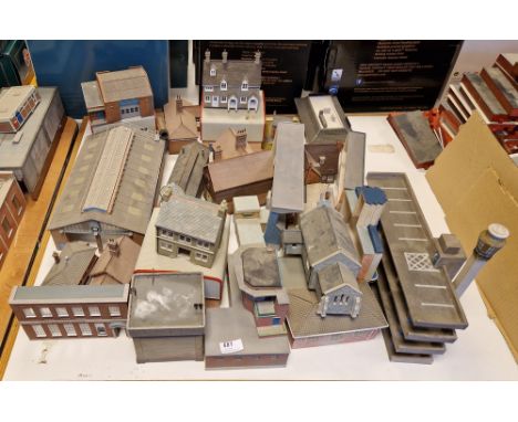 A quantity of Bachmann 00 gauge model railway equipment to include various houses, shop fronts, chimney etc.