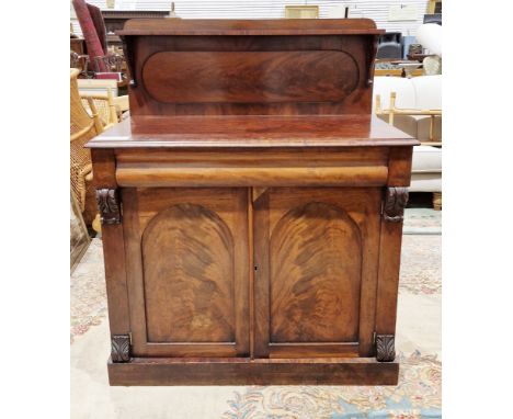 Victorian mahogany and flamed mahogany chiffonier, the square back with single shelf supported by scrolling brackets, the bas