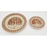Two Wharf Pottery (Mary Wondraush) slipware plates, in sizes, each decorated in cream slip with