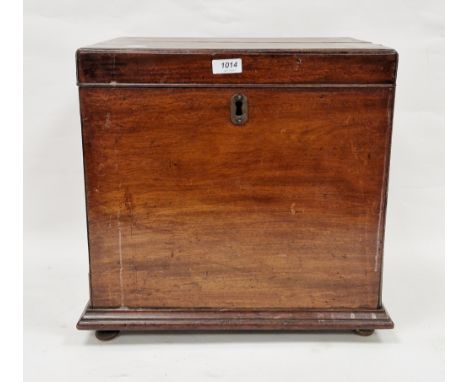 19th century mahogany cellarette, the hinged lid opening to six bottle spaces, drop ring handles to side and later formed doo