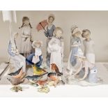 Lladro figure of girl with cello, another Edwardian-style lady with parasol, another girl seated