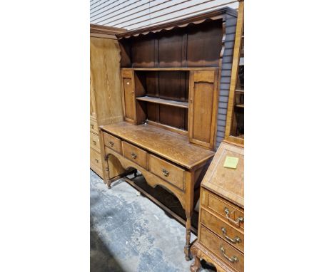 Early 20th century oak dresser&nbsp;in the 18th century manner, the upper section with shelf and two cupboards, the lower sec
