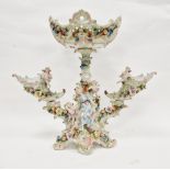 Continental porcelain comport centrepiece, the central oval pierced basket scroll embossed and
