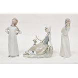 Lladro porcelain figure of a reclining girl with bird on treestump, 18cm wide, a Lladro porcelain