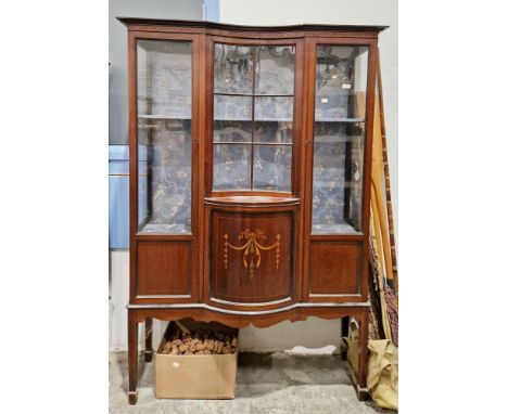 Edwardian mahogany inlaid bowfronted display cabinet with two glazed doors and central inverted bow glass panel, the doors op