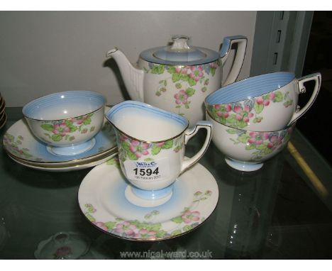 A pretty Royal Doulton Juliet Tea for Two set comprising Teapot, Milk Jug, Sugar Bowl and two cups and saucers