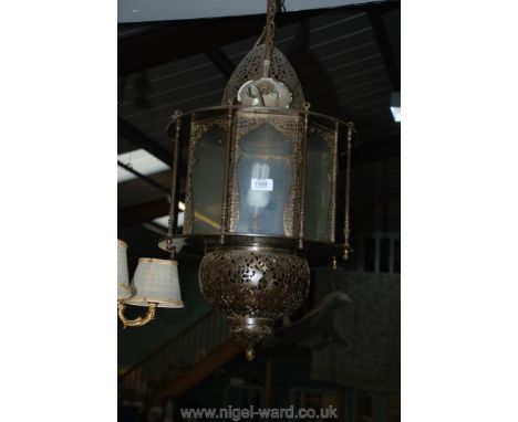 A Persian pierced Brass and glass hanging Lantern. 
