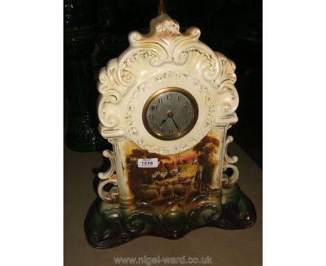 A ceramic Eight day Clock decorated with a Shepherd and Sheep