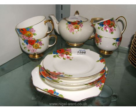 A pretty 1940's Carltonware Sunshine pattern Tea for two Teaset comprising Teapot, Two Trios, Milk Jug, Sugar Bowl and teapot